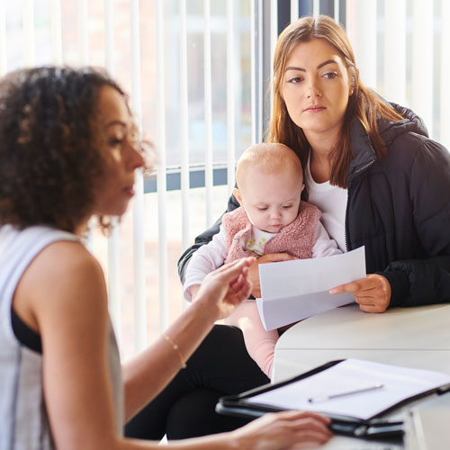 Woman counseling young mother