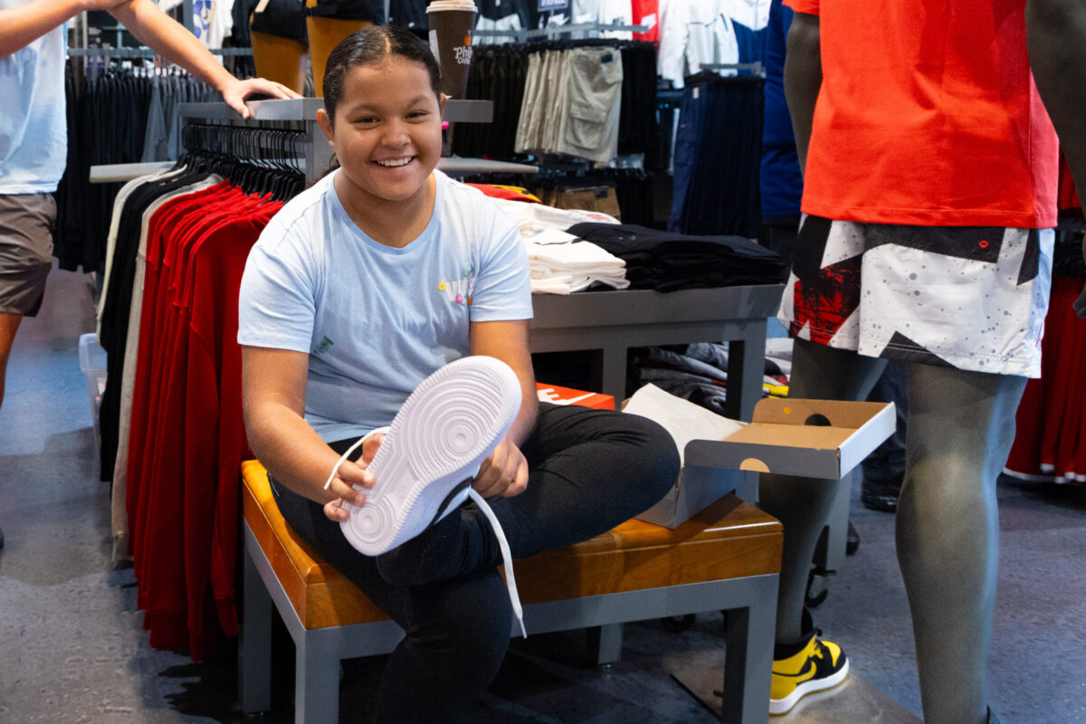Discover the heartwarming event where the community provided children with shoes and supplies for a successful school year.